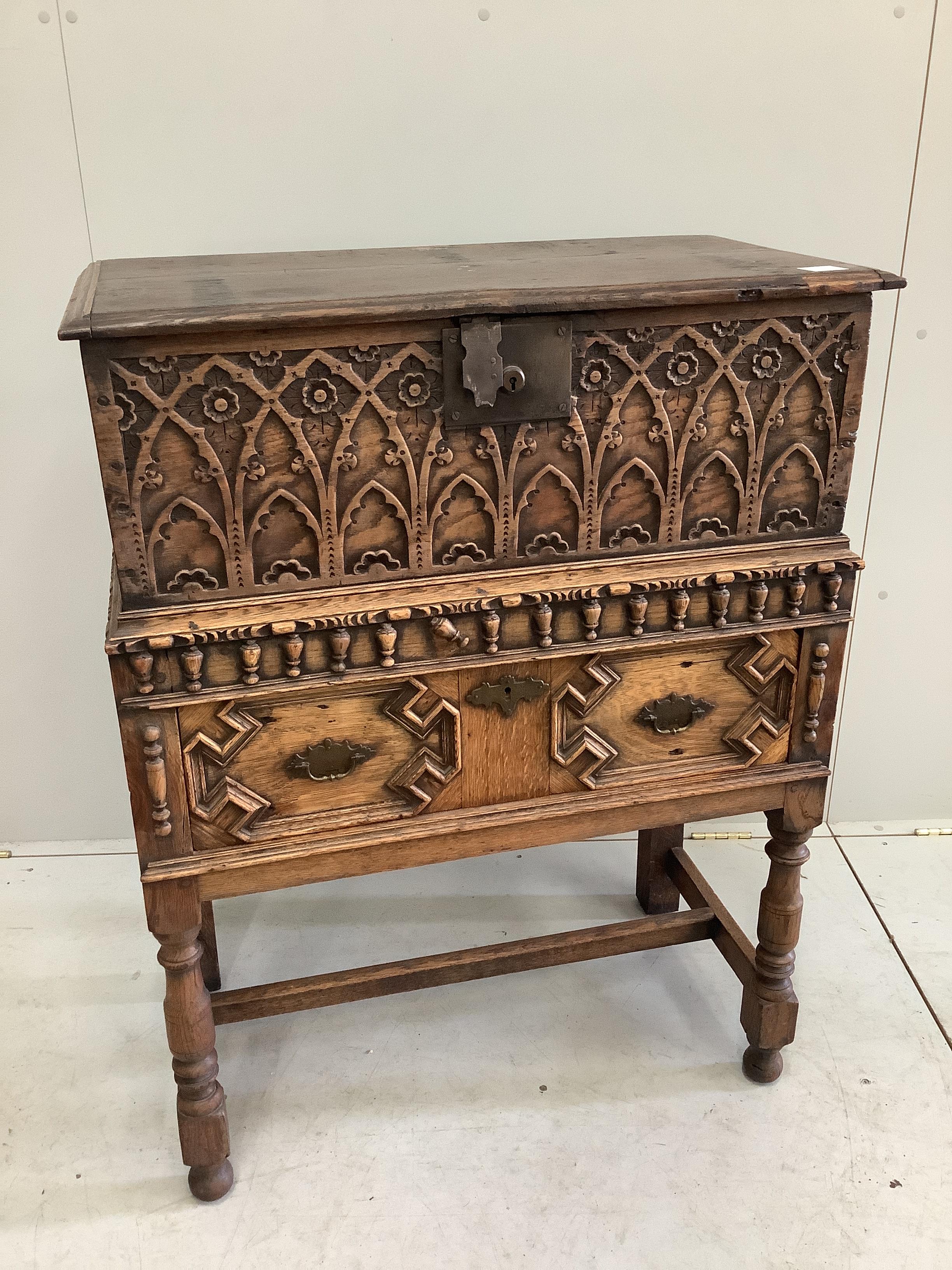 A 17th century style oak bible box on stand, width 81cm, depth 43cm, height 106cm